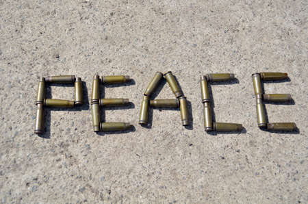 Word Peace created from bullet shellsの写真素材