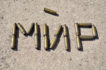 Word Peace on russian created from bullet shells