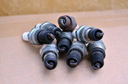 Photo of used spark plugs on the table