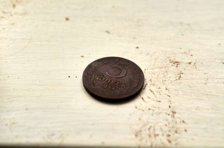 Photo of Soviet coin five kopecks on the tableの写真素材