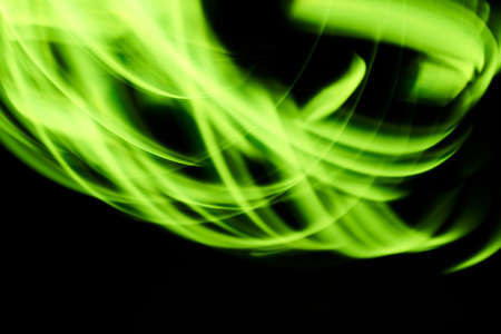 Green plexus light on a black background, abstract picture
