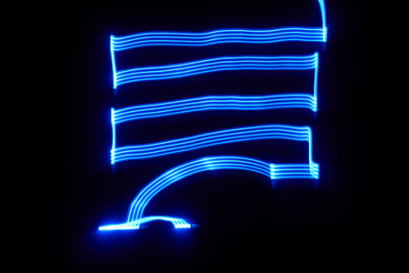 Maze of blue lines in the darkの写真素材