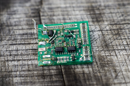 Circuit board macro shot reveals small chip sand SMD capacitors
