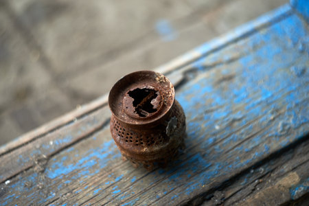 Kerosene lamp burner destroyed by rustの写真素材