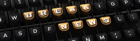 Typewriter with gold buttons in a row, assembling BRAKE NEWS wordの写真素材