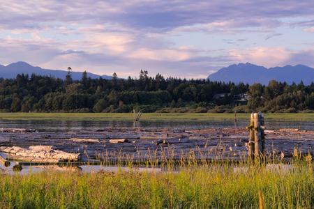 Sunset in countryside river, blue cloudy skyの写真素材