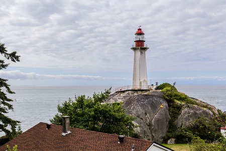 Photo of lighthouse on a cloudy dayの写真素材