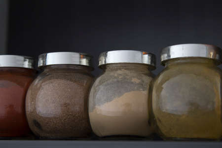 Spices in glass jarsの写真素材