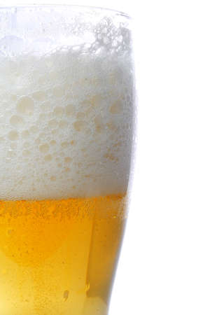 Closeup of Glass of Draught Beer on White Backgroundの写真素材