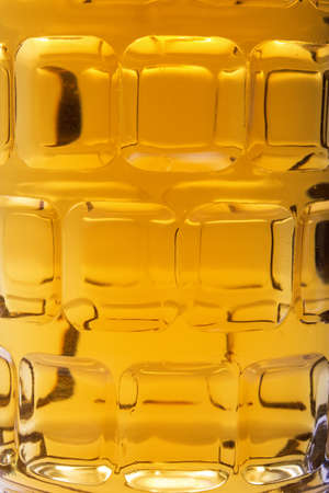 Orange beer and white froth background  Closeup view の写真素材