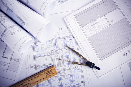Architectural plans with compass divider and ruler on blueprints. Copy spaceの写真素材