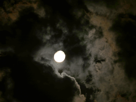 full moon at night clouds skyの写真素材