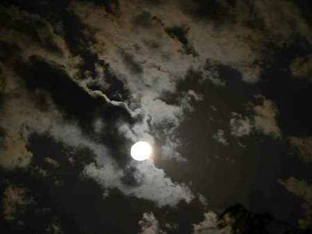full moon at night clouds skyの写真素材