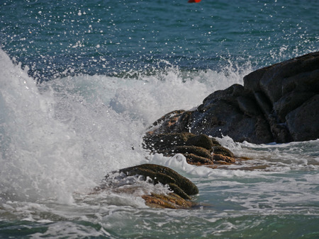 Waves crashing against the rock