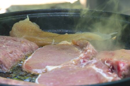 Cooking in electric meat grillの写真素材