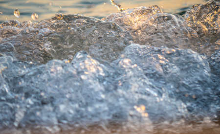wave splash sea beach macro, close upの写真素材