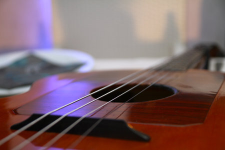Acoustic guitar waiting to be played, close up