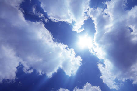 background clouds sun ray light shine beamの写真素材
