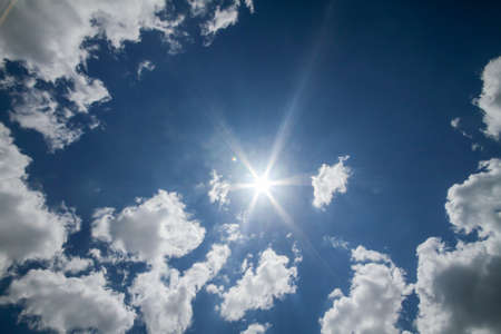 natural clouds blue sky sun ray lightの写真素材