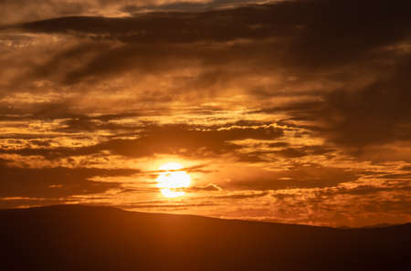 beautiful golden sunset sky landscape, natural backgroundの写真素材