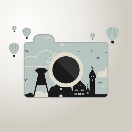 the camera with the image of the houses around balloonsのイラスト素材