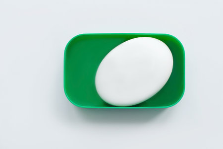 the soap in a soap dish on a white backgroundの写真素材