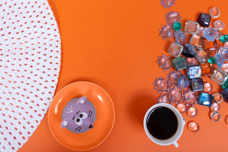 the cake and coffee on an orange background, summer layoutの写真素材