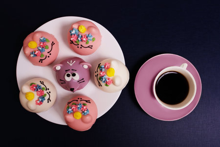 beautiful and delicious pastries with coffee on dark backgroundの写真素材