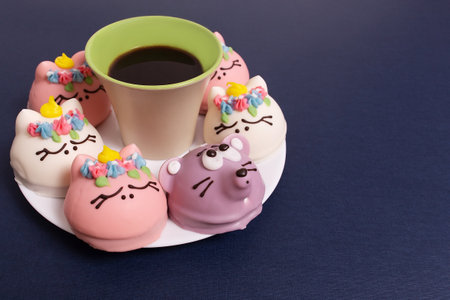 the cup of coffee and cake on a blue backgroundの写真素材