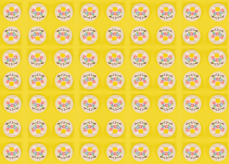 the cake on a yellow background, seamless texture, packagingの写真素材