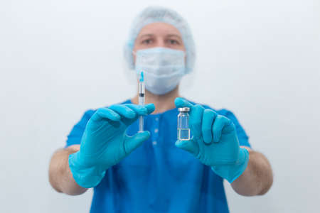 the Medical brother with syringe, vaccinationの写真素材