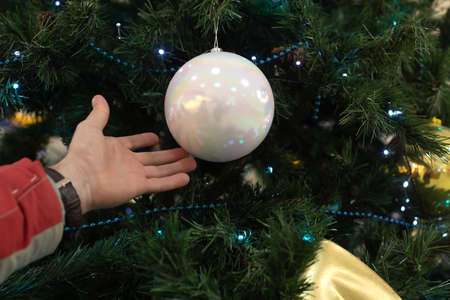 White ball on the Christmas treeの写真素材