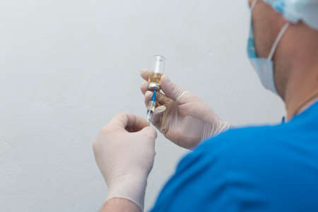 Man's Hands in White Gloves, Vaccine