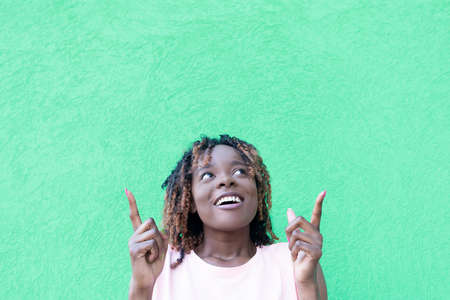 the Beautiful African American shows off hand to side