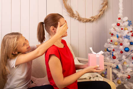the Mother and daughter with a New Year's giftの写真素材