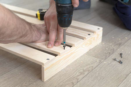 Wooden slats and working tools. Production of wooden products.