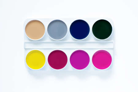 School supplies on a white isolated background. Paints.の写真素材