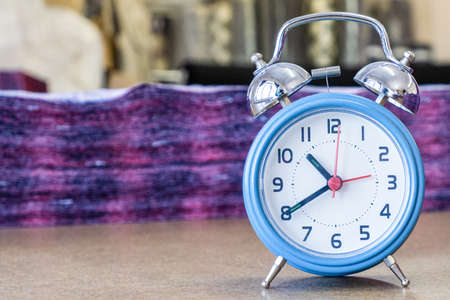 The alarm clock shows the time at the workplace. Working hours.