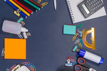 school supplies on a blue background. back to school. Primary school and education.の写真素材