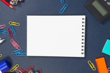 Stationery on a blue background. back to school. education.の写真素材