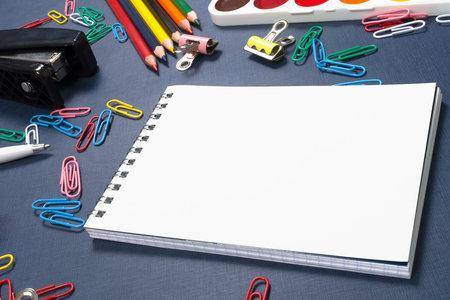 Stationery on a blue background. back to school. education.の写真素材
