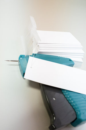 Marking gun. A working tool for attaching labels. textile industry.の写真素材