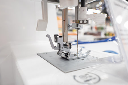 sewing machine. textile industry. employment and labor. labor activity.