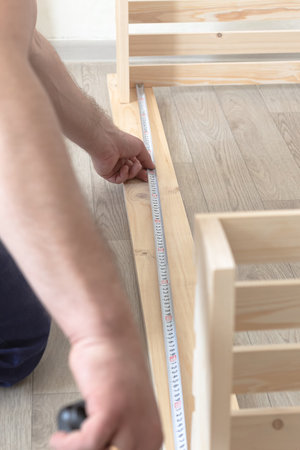 Production of wood products. Carpentry work. Furniture assembly. Employment and labor.の写真素材