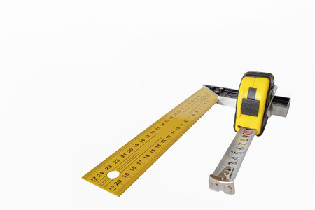 Measuring instruments on a white background. A working tool. Construction and repair.の写真素材