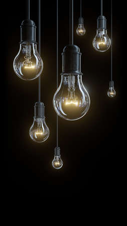 The glowing electric bulb lamps on black background 3D renderの写真素材