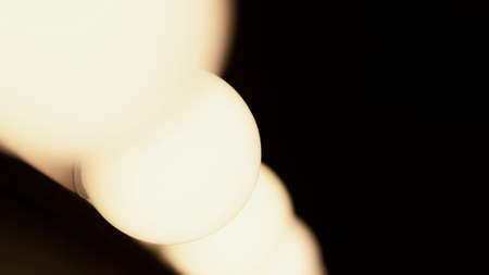white lamps on a black background