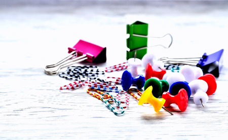 Paper clips paper clips on a gray blurry background, a place for copyright