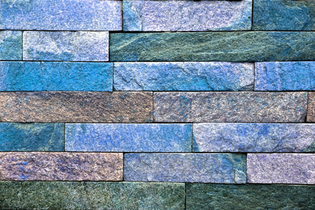 Color stone wall, background, texture, rectangular natural stones of different shades