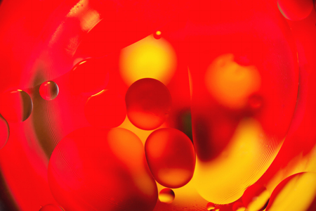 background, multicolored balls, blur, texture, heterogeneous color,red-yellow toneの写真素材